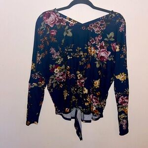 IZ BRYER, beautiful floral top tie bottom and Chris crossed looking back.